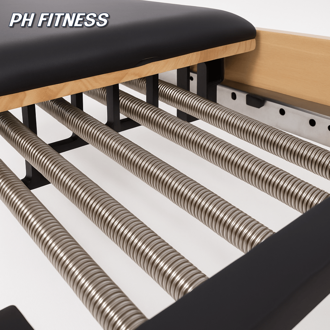 Detail van de horizontale veren onder het zwarte beklede ligvlak van de PH Fitness Cadillac Tower