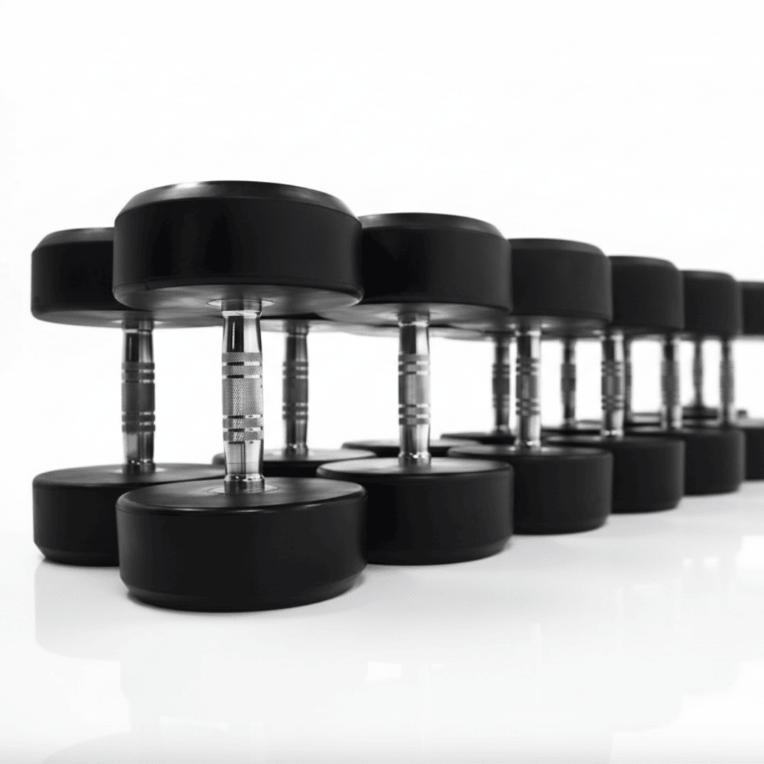 Row of professional round rubber-capped dumbbells with chrome handles for commercial or home gym use.